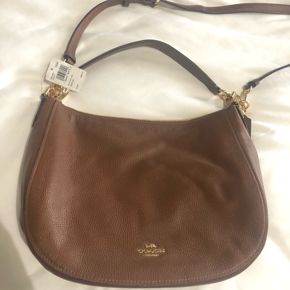 Leather brown Coach shoulder or cross body bag.